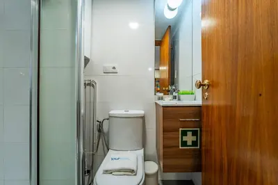 a bathroom with a toilet and a sink at Essence Oporto Apartment Downtown in Porto