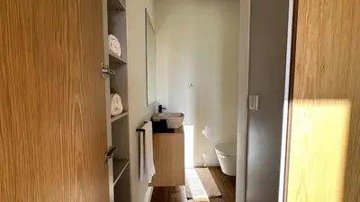 a bathroom with a toilet and a sink at BEST - Apartment with AC, Parking and Balcony in Porto