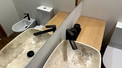 a bathroom with a sink and a toilet at BEST - Apartment with AC, Parking and Balcony in Porto