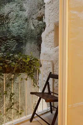 a living room with a couch and a table at Oasiys - Your Getaway in Porto in Porto