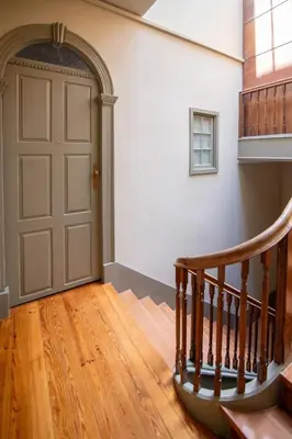an empty room with a door and a staircase at Once Upon In Porto Apartments II in Porto
