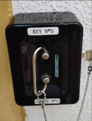 a key hanging on a wall at Porto Chique AL 5 in Porto