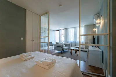 a living room with a couch and a table at Oporto Chic and Glamorous Downtown with Terrace-F in Porto