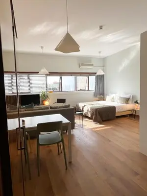 a bedroom with a bed and a desk in a room at Casa Sophia in Porto
