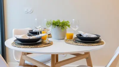 a kitchen with a counter top in a room at Charming apartment frente in Porto