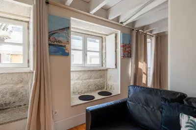 a bedroom with a bed and a mirror and lamps at Vaz Porto Apartment - Porto Velho Apt in Porto
