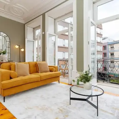 Loft with private balcony and a classic ceiling