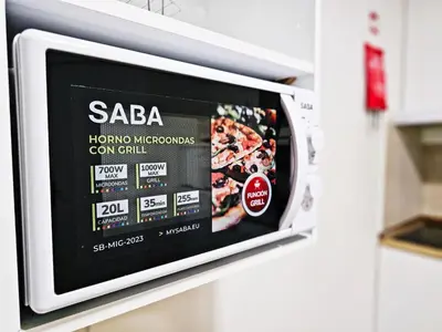 a sada microwave oven is on a shelf in a store at Ninho Studio in Vila Nova de Gaia