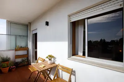 a kitchen counter with a toaster on a counter top at Casa Guilhermina, Sunny Studio with Balcony in Porto