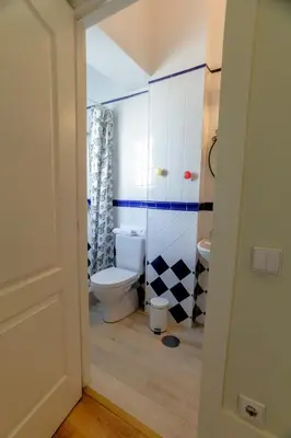 a bathroom with a toilet and a sink at Cedofeita Downtown Nightlife by PCH in Porto