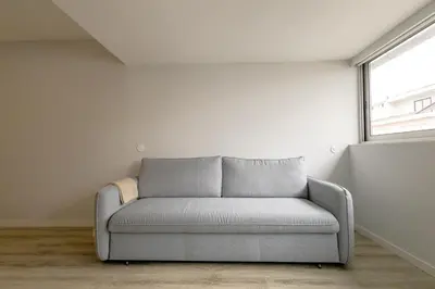 a white bedroom with a bed and a closet at Happy Downtown Apartments by PCH in Porto