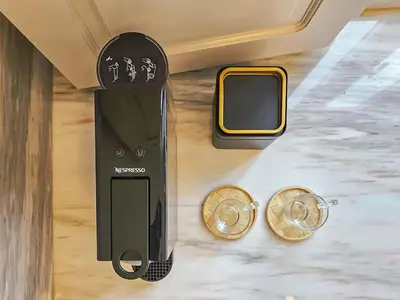 a smart phone and two watches on a counter at Wood Haven Luxury Duplex Downtown Porto with AC in Porto