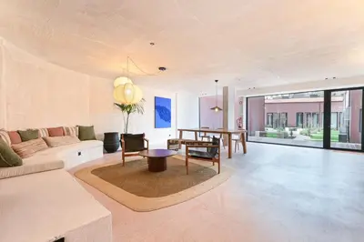 a living room with a couch and a table at ON Apartments - Cozy - Free Parking & Pet Friendly in Porto