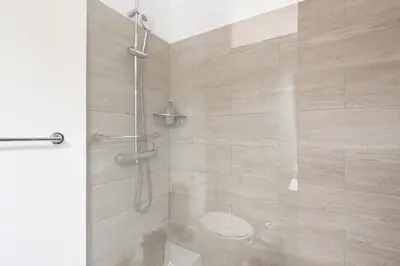 a bathroom with a shower with a toilet at Breeze Oporto Boavista Terrace in Porto