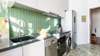 a bathroom with a toilet and a sink at Porto Essence Apartment in Porto