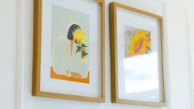 three framed pictures of a woman holding a sunflower at Trendy 2BR Near Douro River by LovelyStay in Vila Nova de Gaia