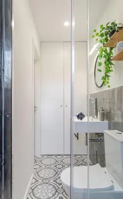 a bathroom with a toilet and a sink at Stylish Studio w/ Charming Terrace by HostWise in Porto