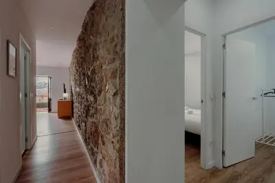 a white bed with two towels on top of it at House River View by Best2Stay in Vila Nova de Gaia