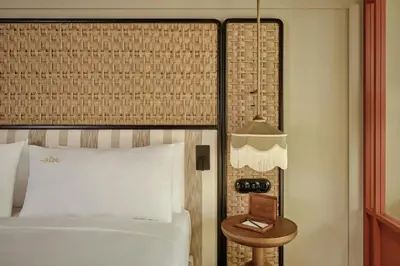 a living room with a couch and a large window at Origine Porto Gaia, a Tribute Portfolio Hotel in Vila Nova de Gaia