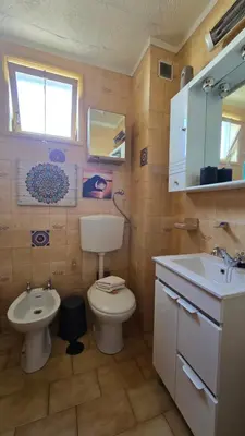 a bathroom with a toilet and a sink at Classic Charm of an Old Porto free parking in Vila Nova de Gaia