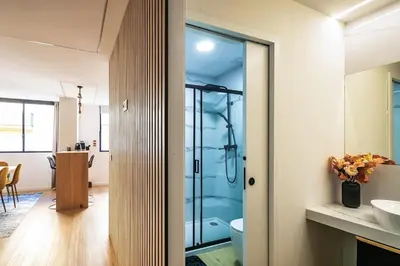 a bathroom with a shower and a sink at Yellow Breeze Apartment by Cozy Stay in Porto