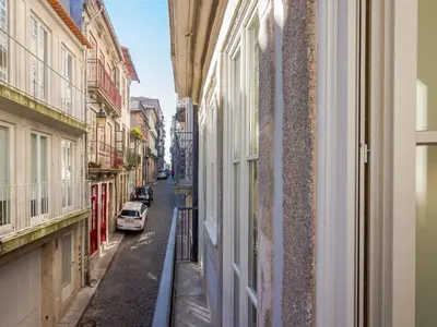 a view of a street from a window of a building at Central Porto apartment with balcony in Porto