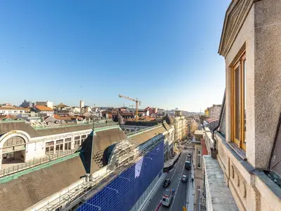 a view of a city street from a building at Beach studio nearby market in Oporto in Porto