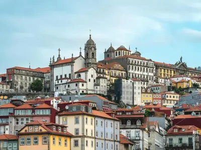 a group of buildings on top of a hill at Charming Apartment in Porto's Heart in Porto