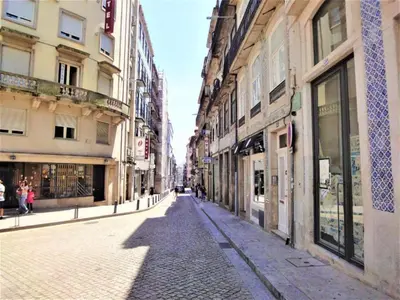 an empty street in a city with buildings at Cozy Getaway in Porto with Balcony in Porto