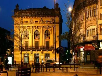 an old building with a table in front of it at Apartment in Porto with balcony in Porto