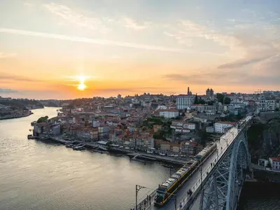a view of a city with a bridge and a river at Charming Modern Studio in Porto in Porto