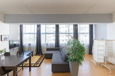 a living room with a couch and a table at Oporto Spacious apartment in Porto