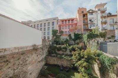 a view of a city from above with buildings at Flores Premium by Hosty in Porto