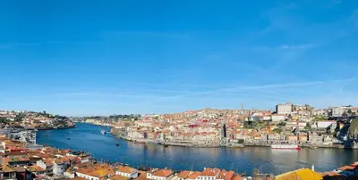 a view of a city with a river and buildings at Casa Vista Douro in Vila Nova de Gaia