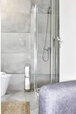 a bathroom with a shower with a glass door at Art Quarter Oporto City Center in Porto