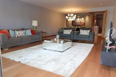 a living room with two couches and a coffee table at Refúgio Douro à Vista in Porto