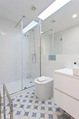 a bathroom with a toilet and a shower and a sink at Aposentus - Poveiros Terrace View in Porto
