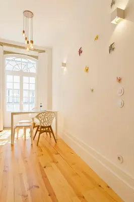 a dining room with a table and a bench at APOSENTUS - Your home in Almada in Porto