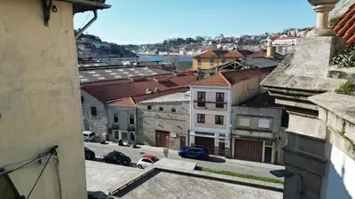 a view of a city with buildings and a street at Riverside Studio By Luís Bridge, WOW & Half Rabbit in Vila Nova de Gaia