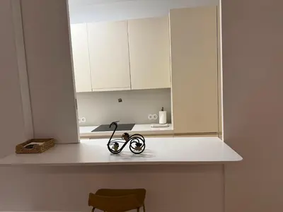 a pair of scissors sitting on a counter in a kitchen at Apartment in Market Bolhão- W Views 2F in Porto