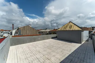 a building on top of a roof at Close to Everything Your Oporto Yellow PRM 1F in Porto