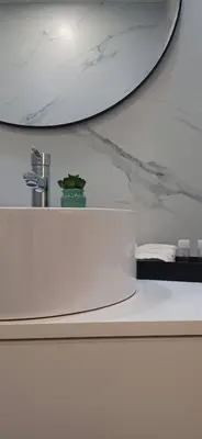 a bathroom counter with a sink and a mirror at Barramares Concept Lifestyle Oporto City Center in Porto