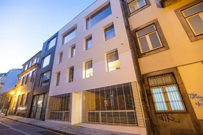 a building on a street with graffiti on it at Porto Gallery District Escape, Central Retreat in Porto