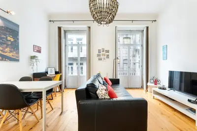 a living room with a couch and a table at GuestReady - Dolce experience in Porto in Porto