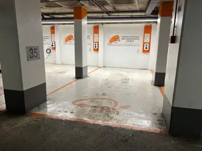 an empty parking garage with a large room with a number sidx at Crystal Palace Oporto Flat - With Two Bedrooms in Porto