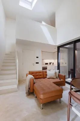 a building with a row of windows on the side at Minimalist Loft @ Terracotta Collection in Porto