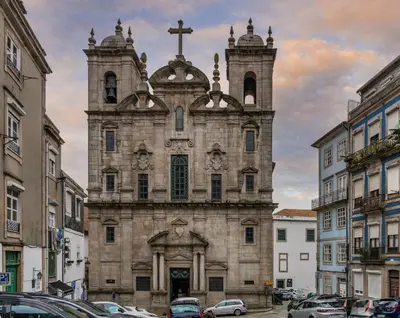 an old church with two towers and a cross at Porto Insight Apartments - Belomonte in Porto