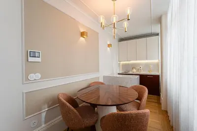 a dining room with a table and chairs at GuestReady - Elisium Star in Porto