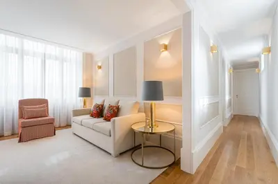 a living room with a couch and a table at GuestReady - Elisium Star in Porto