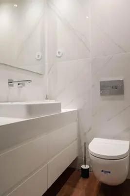 a white sink with a faucet in a bathroom at Liiiving in Porto - The Prestige Apartment A in Porto